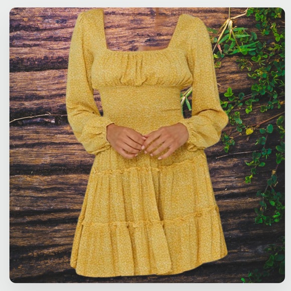 Dresses & Skirts - Darling little golden dress with tiny white flowers! This is brand new! BNIP